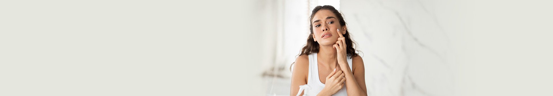 brufoli sulle guance