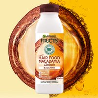Flacone di Balsamo Fructis hair food con olio di macadamia lisciante
