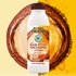 Flacone di Balsamo Fructis hair food con olio di macadamia lisciante