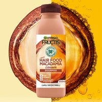 Flacone di Shampoo Fructis hair food con olio di macadamia lisciante