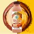 Flacone di Shampoo Fructis hair food con olio di macadamia lisciante